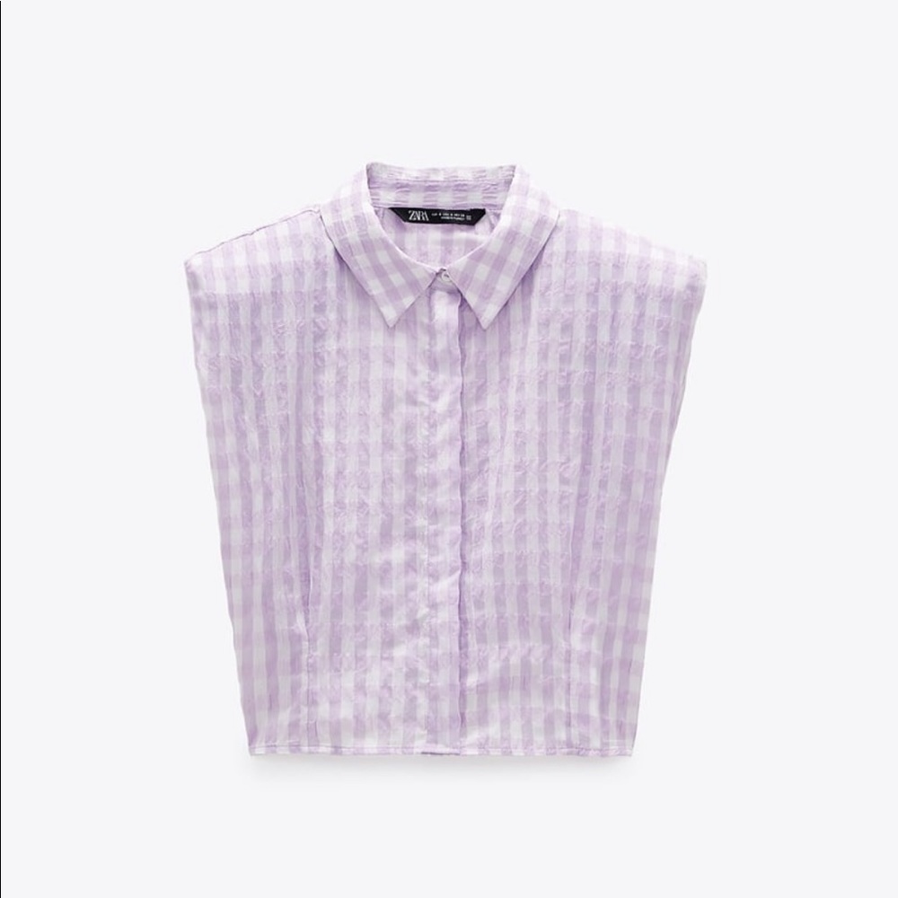 Sleeveless shirt with shoulder pad